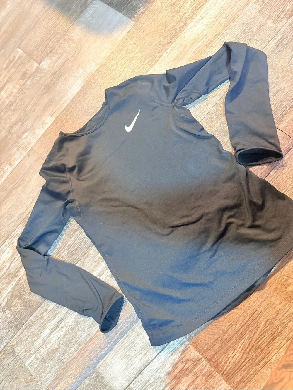 Nike Black Women's Long-Sleeve Athletic Top with Swoosh